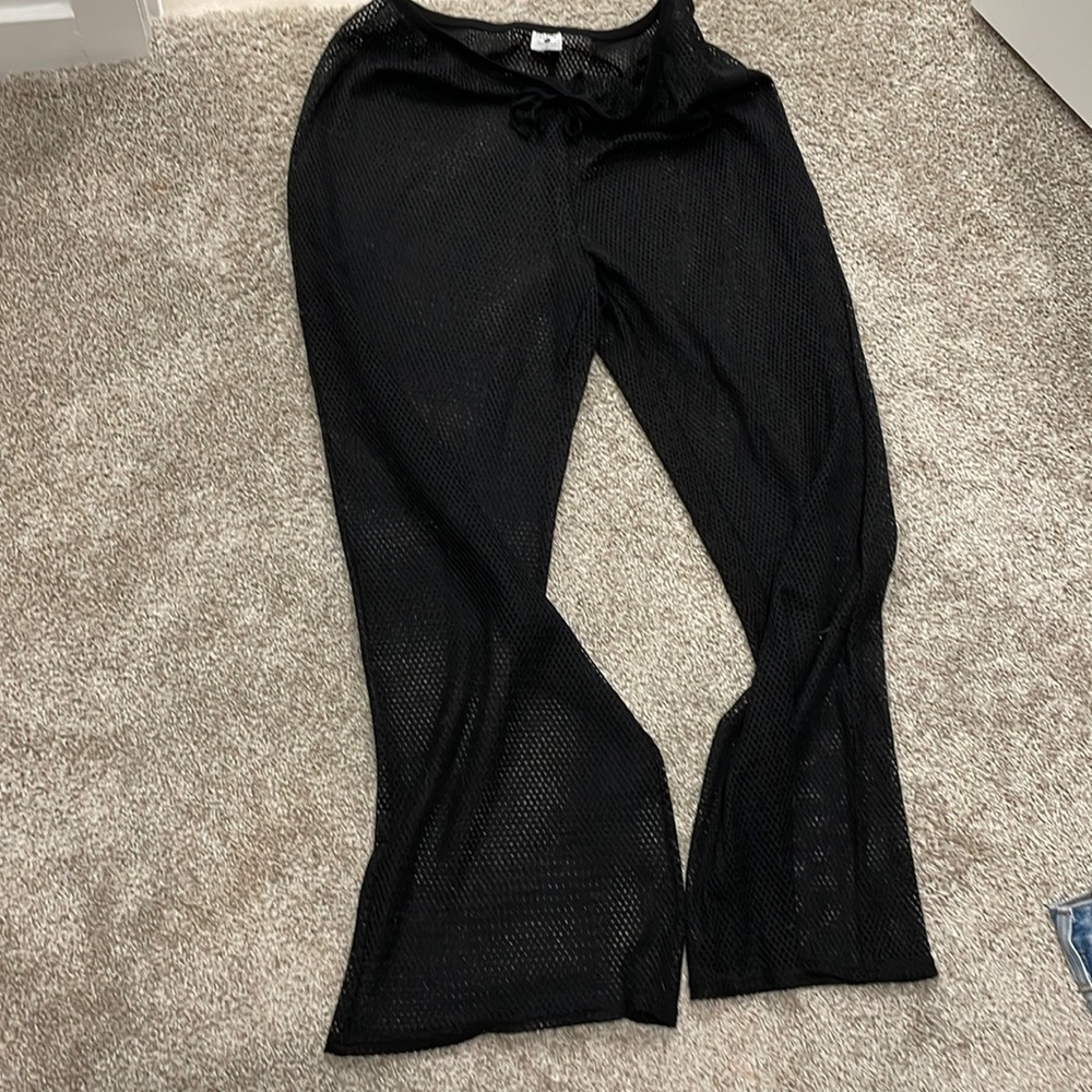 Black pants with swimsuit coverup
